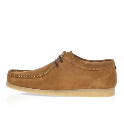 Brown suede wallabee shoes